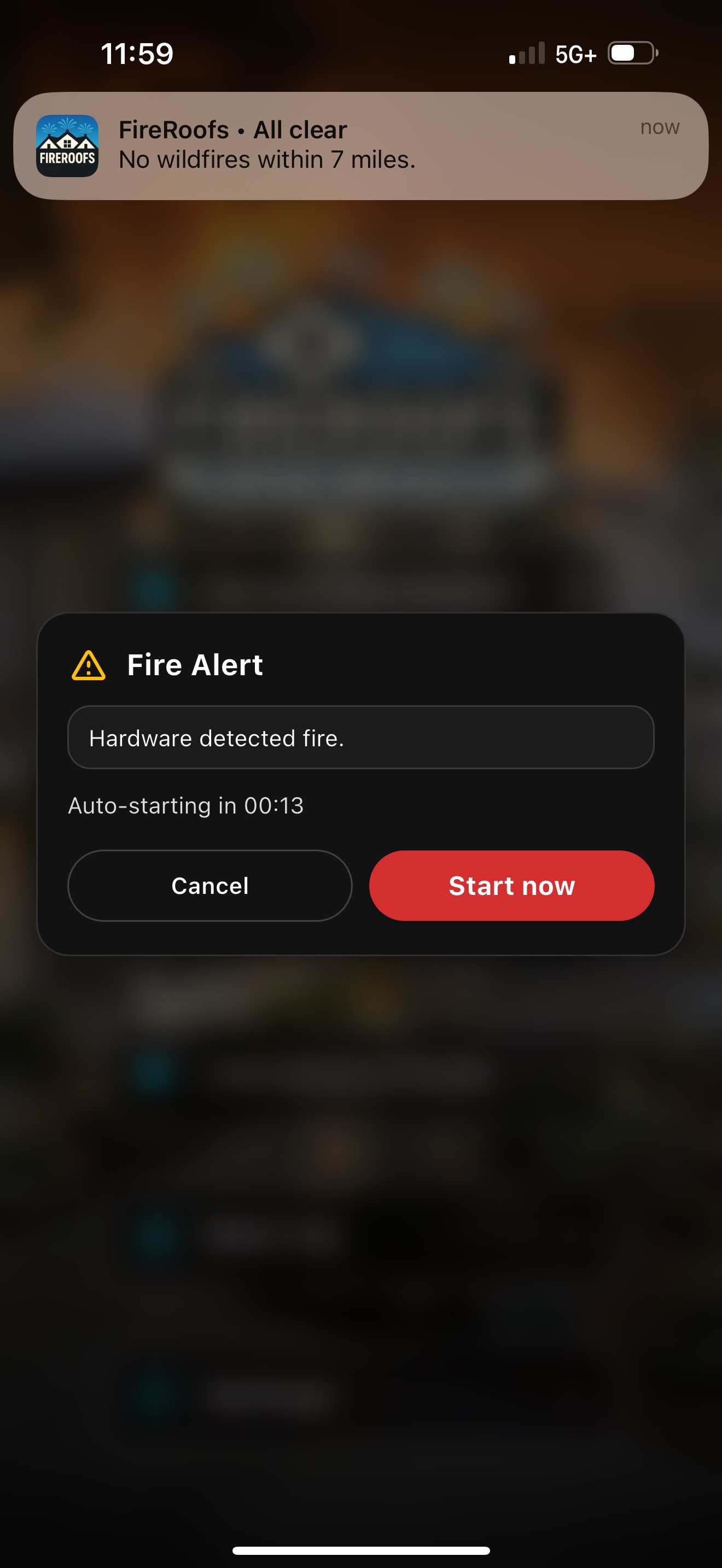 FireRoofs app Fire Alert notification showing hardware fire detection with auto-start countdown and manual start option