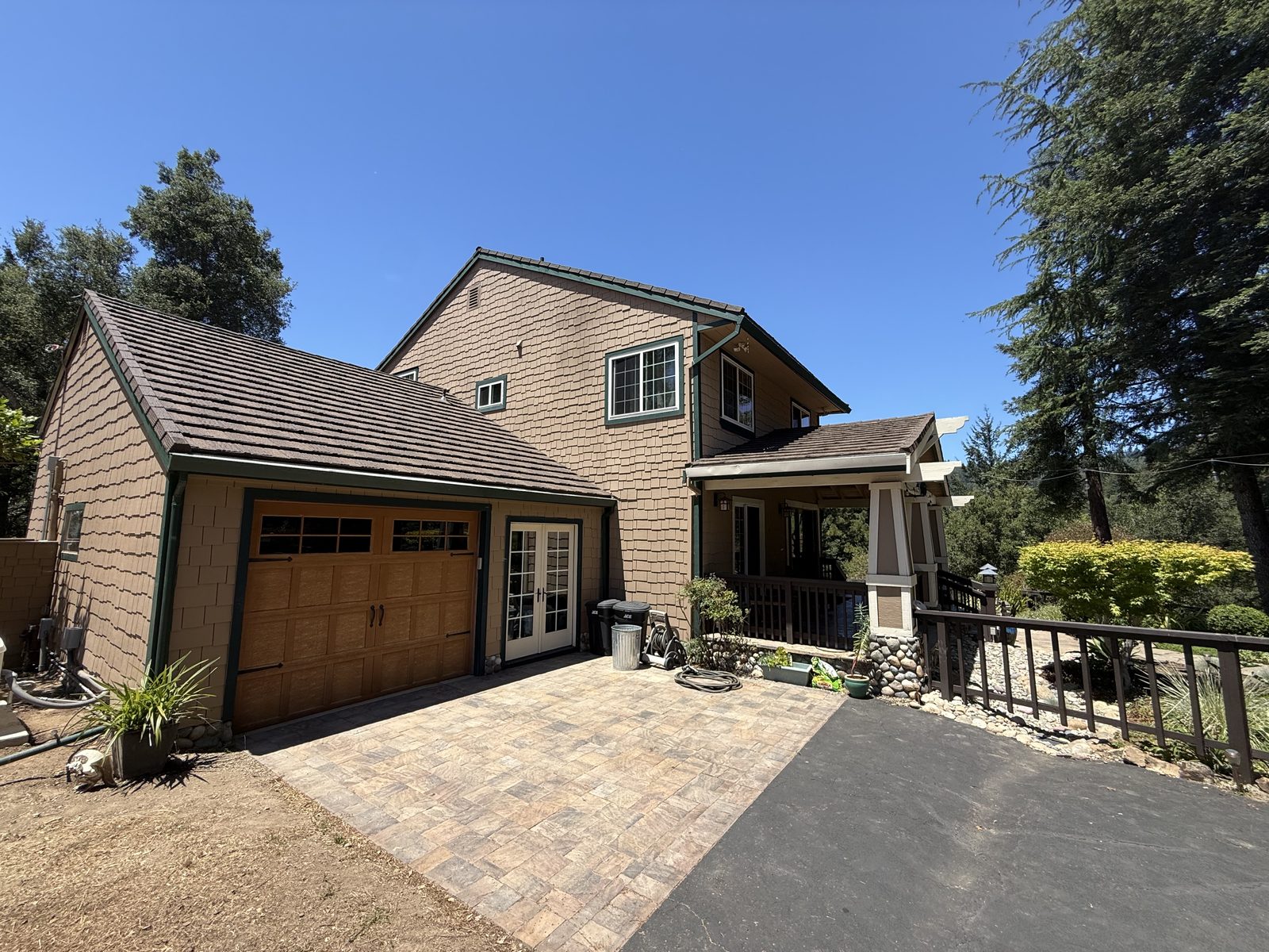 Front view of a Bay Area craftsman home with garage and covered porch scheduled for a FireRoofs Fortress wildfire sprinkler installation