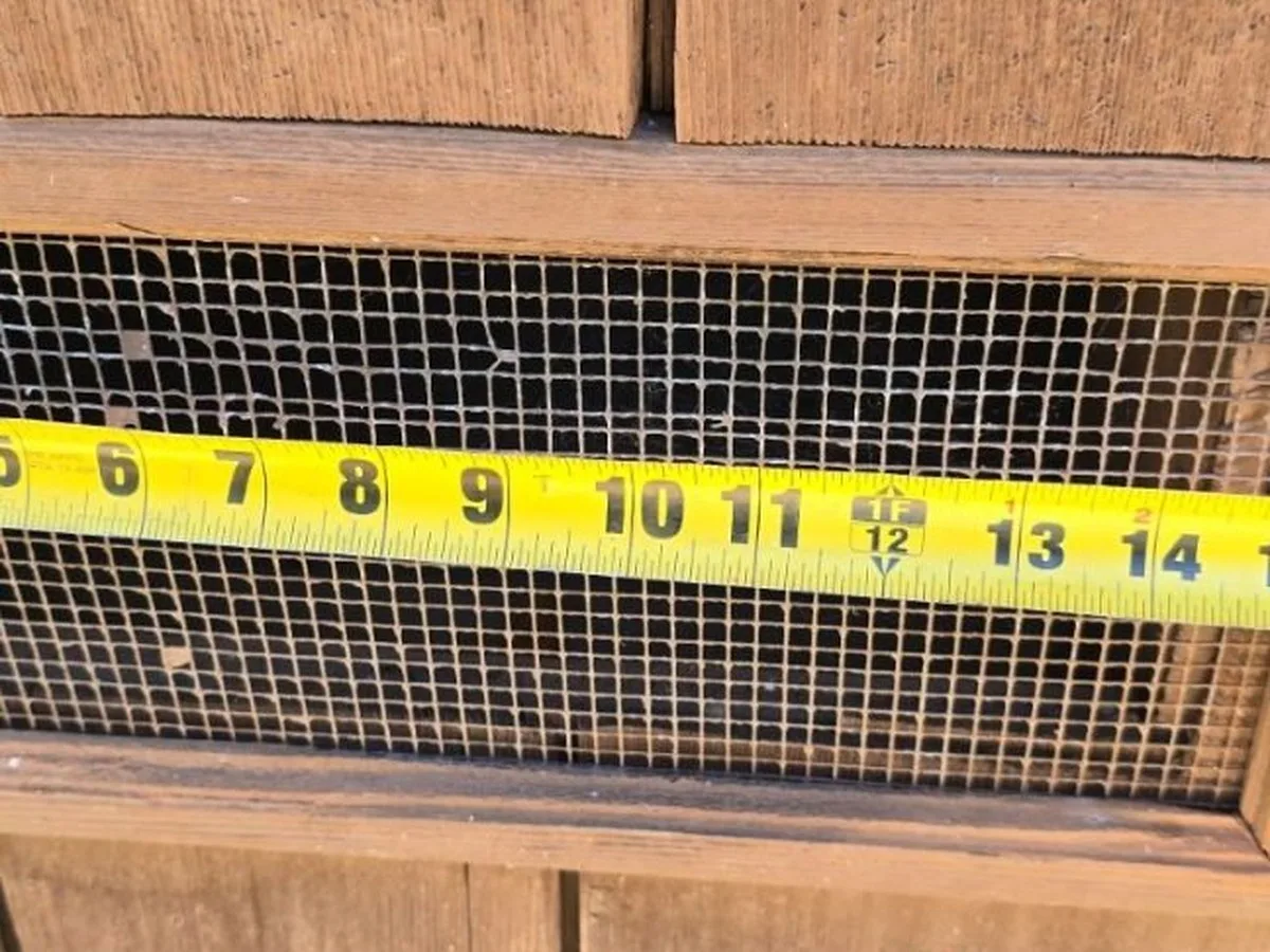 Original gable vent on a Portola Valley home with screening open enough for embers to pass