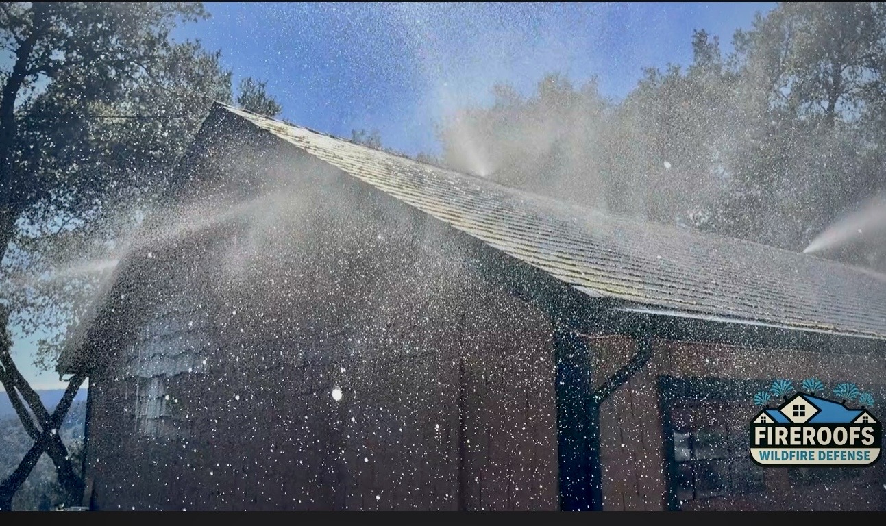 FireRoofs roof sprinklers running a full coverage test on a home off Summit Road in the Santa Cruz Mountains, water mist covering the entire roof