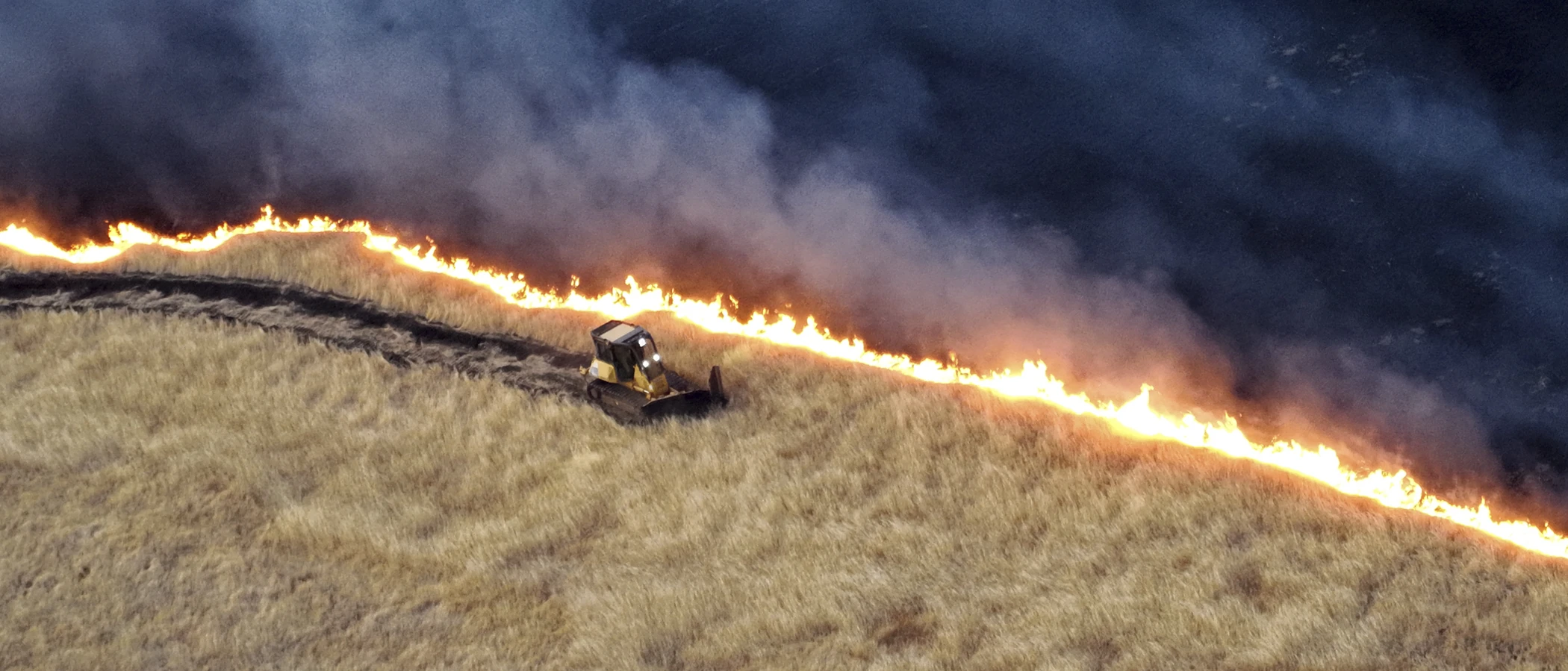 Grassland fire burning along the Dublin-San Ramon border during the 2025 Parks Fire
