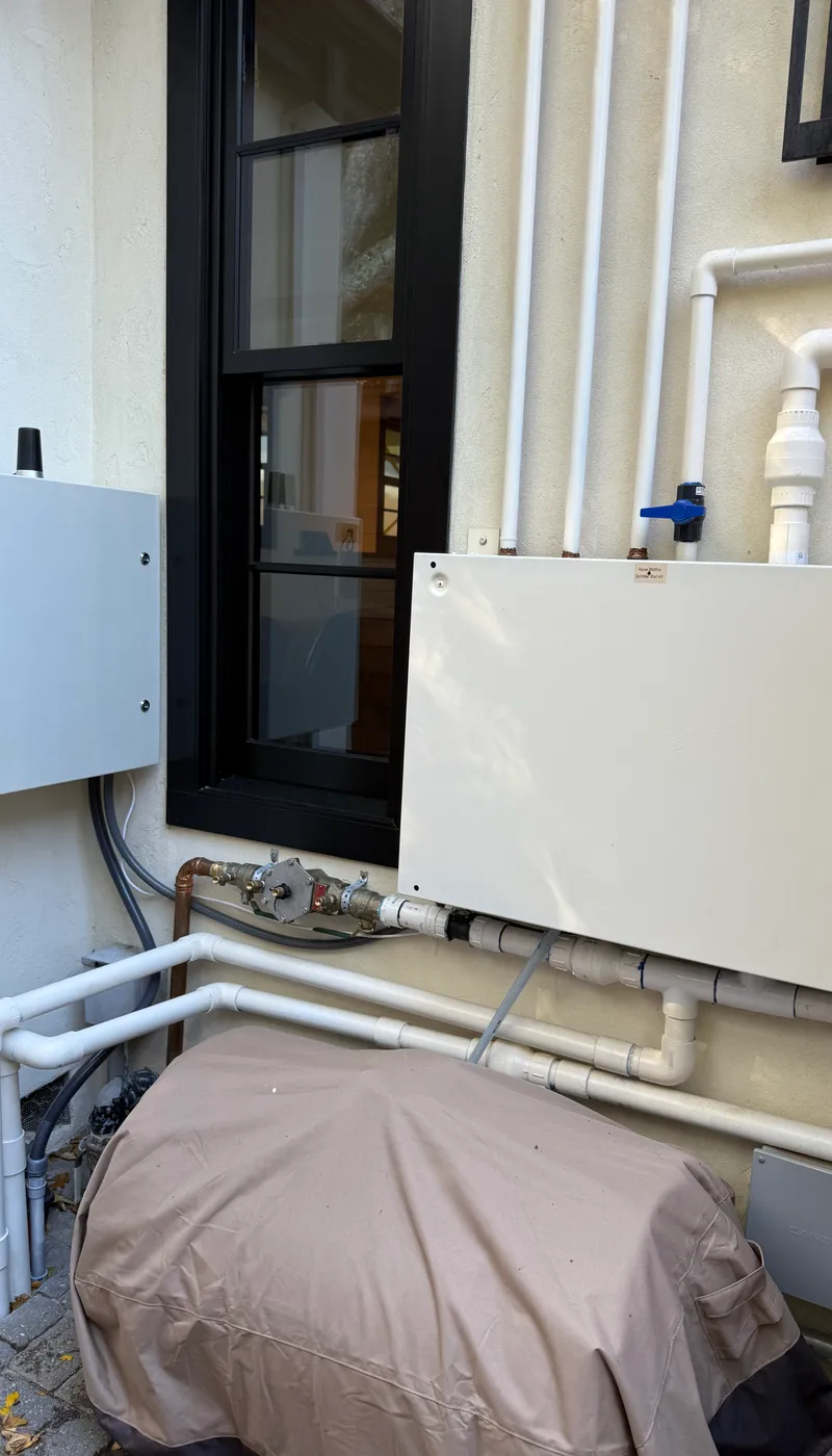 FireRoofs control panel and plumbing installation on Bay Area home exterior