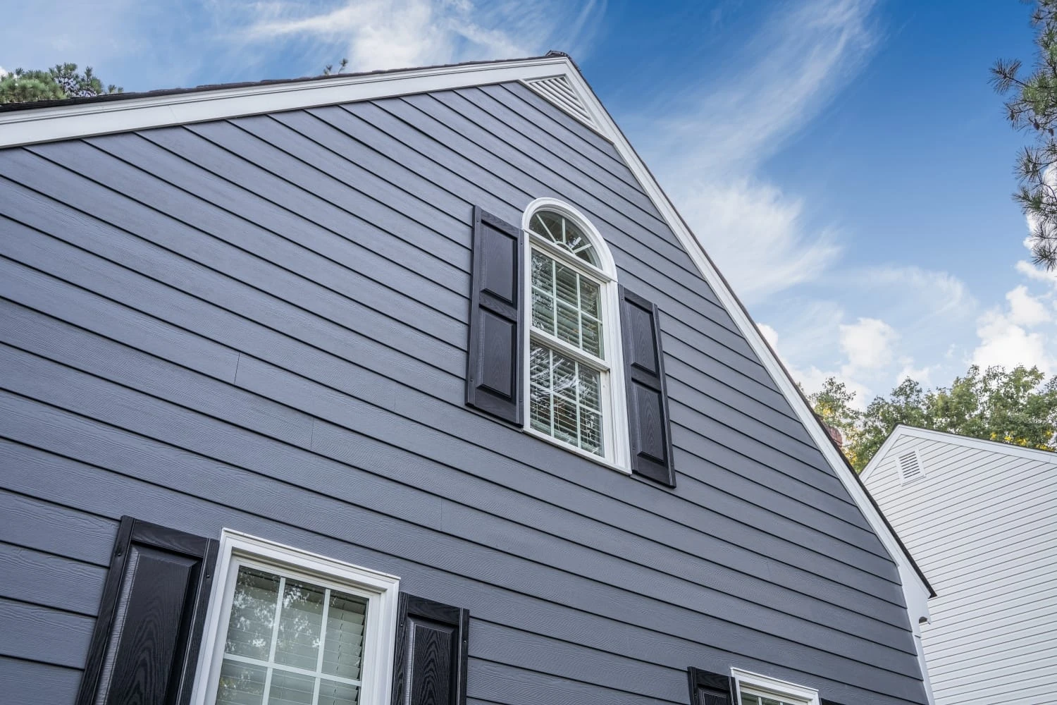 Multi-pane tempered glass windows installed on a home in a wildfire zone